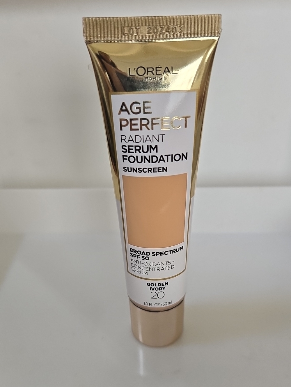 Age Perfect Radiant Serum Foundation SPF 50 - Golden Ivory 20